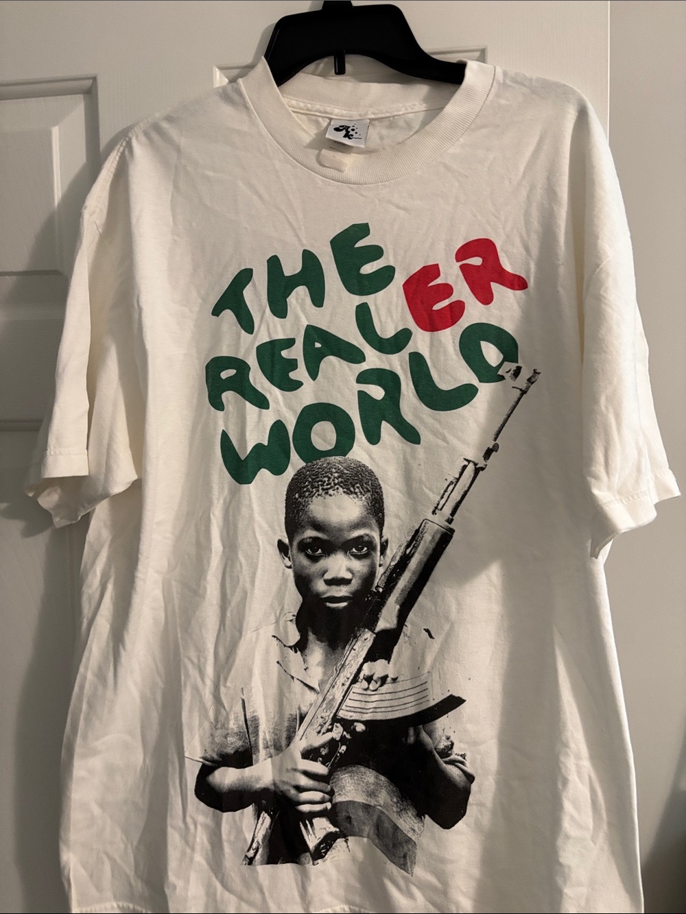 White Short-Sleeve Graphic Tee with Green & Red Text